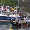 Bunting decorates the boats in Mevagissey Harbour, Cornwall