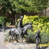 Bronze sculpture in the grounds of Glastonbury Abbey, Somerset