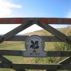 A National Trust sign. Trevarrian, Cornwall