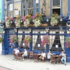 Cheerful, flower-bedecked pub, London