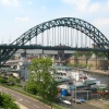 The Tyne Bridge with the floating Night Club below.