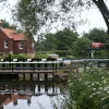 2008. The weir and the lock keepers cottage on the river Wey. nr. Pyrford Sy.