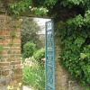 Gateway between gardens at Sissinghurst, Kent