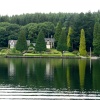 Windermere shore as seen from pleasure craft.