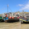 Boats beached in St Ives harbour at low tide
