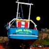Another fishing boat on the beach