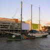 The Greenpeace Ship, Rainbow Warrior, moored on the Thames close to Tower Bridge