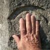 Tommy Layden's hand in stonemason's signature