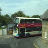 Two double deckers meeting on corner!