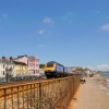 Dawlish promenade with first Intercity 125 heading out of Dawlish - June 2009