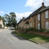 The main street in Ravenstone looking up towards the Church.