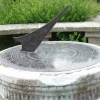 A sun dial near the house