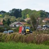 Tractor and Trailer winding it's way through the village