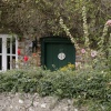 Cottage in village with flowers