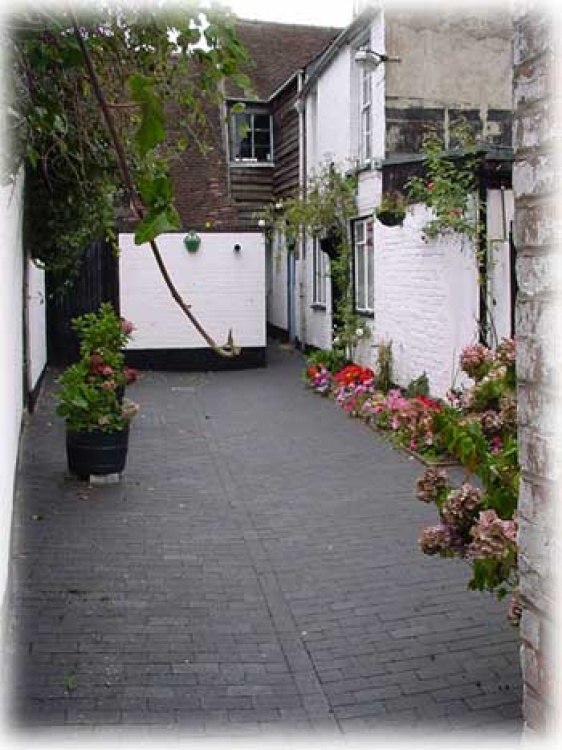 A typical court area in one of Tewkesburys alleyways