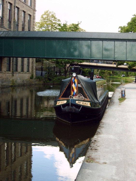 Narrowboat, Mr. Kite, moored on the Leeds and Liverpool Canal, Saltaire, West Yorkshire