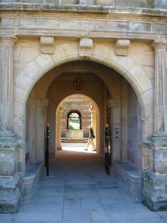 Looking through the courtyard to the gardens beyond, Lyme Park, Cheshire