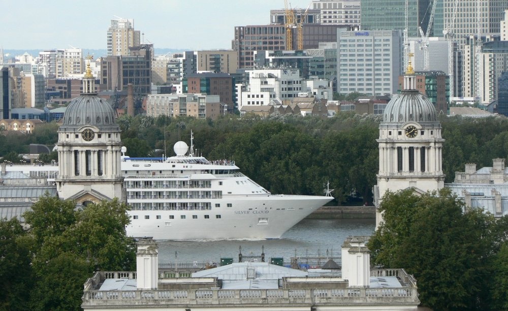 The cruise ship 'Silver Cloud' passing down The Thames through Greenwich.