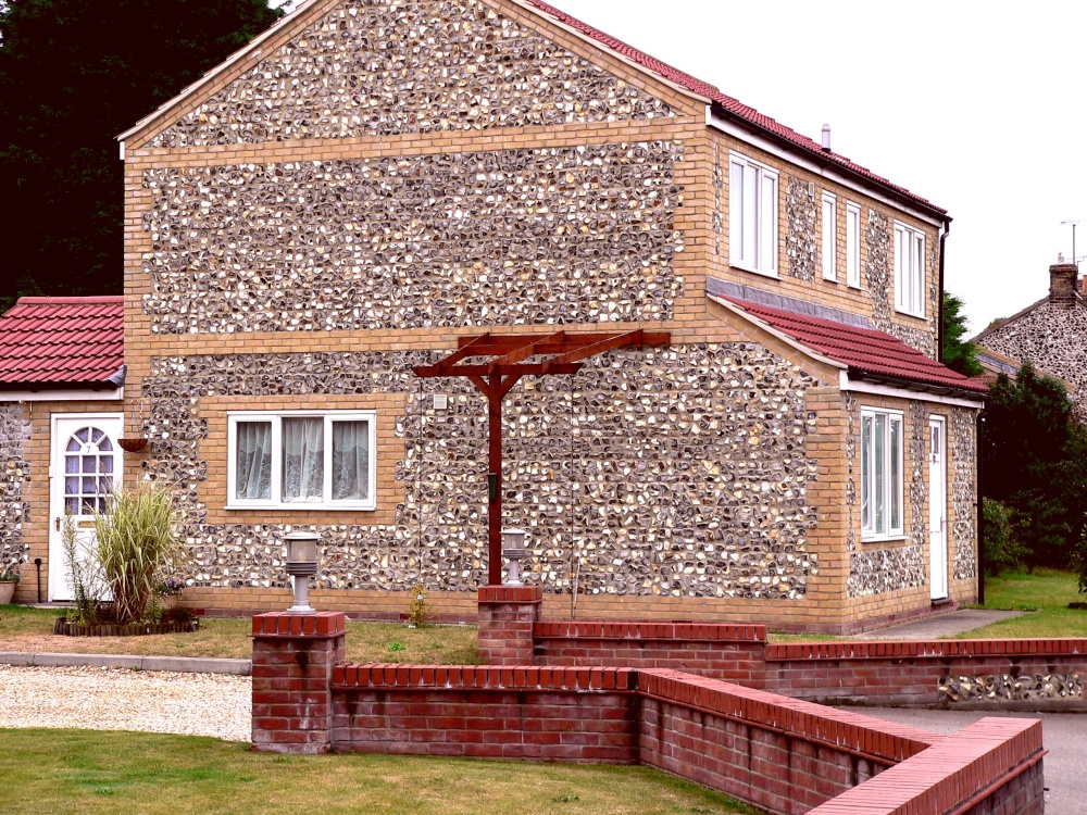 Typical modern house with traditional flintwork in Brandon, Suffolk.