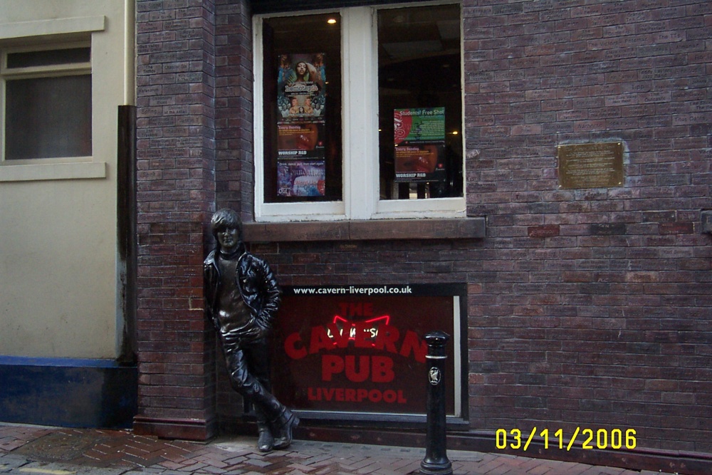 Statue of John Lennon opposite the site of the Cavern Club in Liverpool, Merseyside.