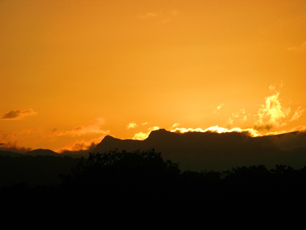 Sunset behind the Langdales as seen from Windermere.