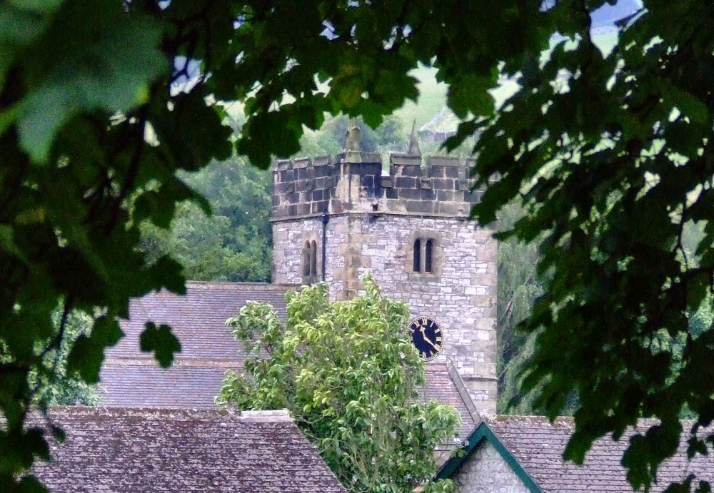 The church through the trees at Ashford