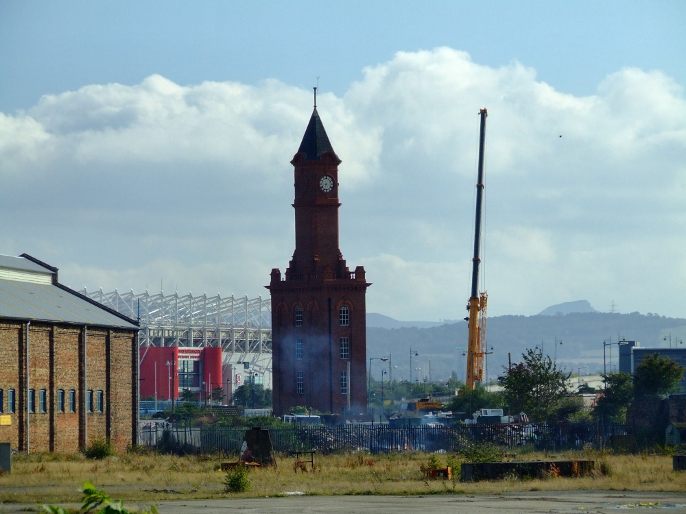 Clocktower and crane on the banks of the Tees