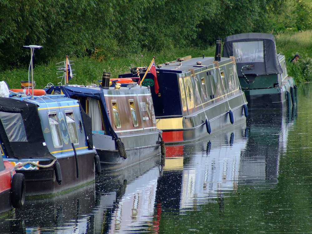 Colourful narrowboats at Slimbridge