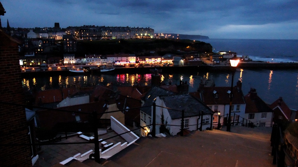 Whitby Harbour by night from steps up tp Abbey