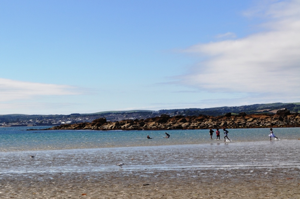 Children playing in the sea at St. Michael's Mount