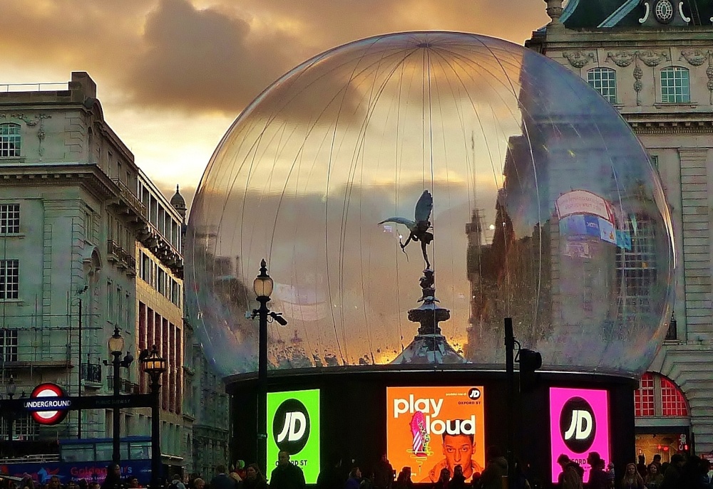 As evening falls on Piccadilly Circus.