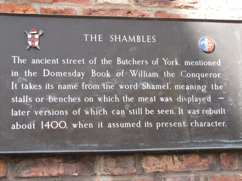 A sign outlining the history of The Shambles, York