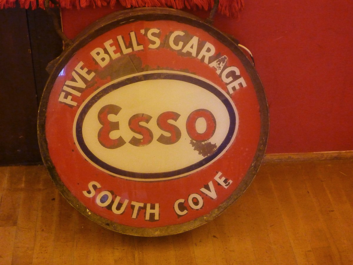 A very old petrol sign at South Cove