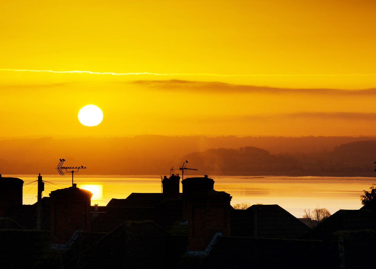 Sunrise across the rooftops, Chepstow.