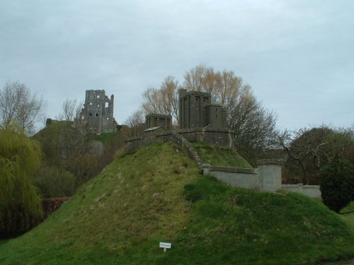 Model village version of Corfe Castle with the real thing in the background. Near Wareham, Dorset.