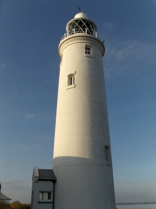 The lighthouse on the spit by Hurst Castle, near Lymington Hampshire, UK.