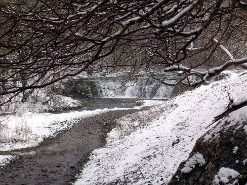 Waterfall in Lathkill Dale, Derbyshire, on a snowy day, March 2006.