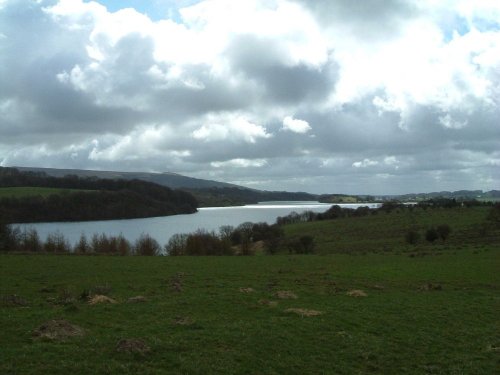 View down one of Rivington's reservoirs with the pike in the distance. Rivington, Lancashire