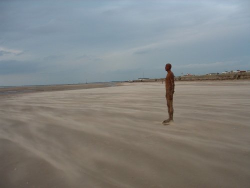One of the Anthony Gormley figures at Crosby, Merseyside