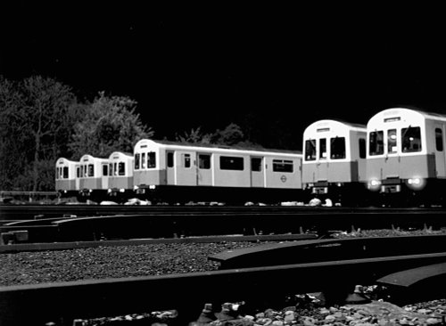 Trains stabled at Upminster underground train depot at about 4.00am. Essex. in the early 1980s.