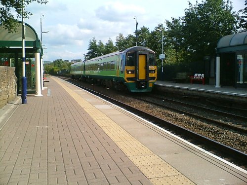 The Leeds To Blackpool train rushes through Oswaldtwistle Station