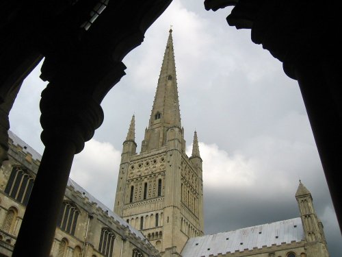 Norwich, Norfolk. View of spire of Cathedral from cloisters