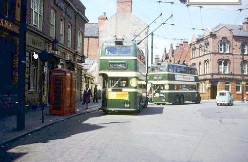 View looking at Trolley buses in Bulwell Market Nottingham (circa 1966)