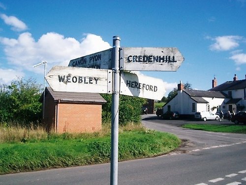 Direction sign at Tillington crossroads on the former Turnpike Road from Hereford to Weobley.