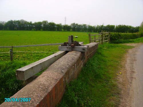 An old sluice gate to control the water flow around the fields in Littleborough in Nottinghamshire