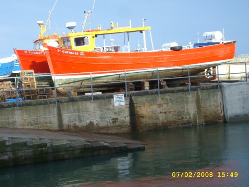 Lifeboats on dock Seahouses