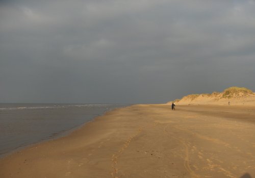 A cyclist heads towards Southport - on foot.....