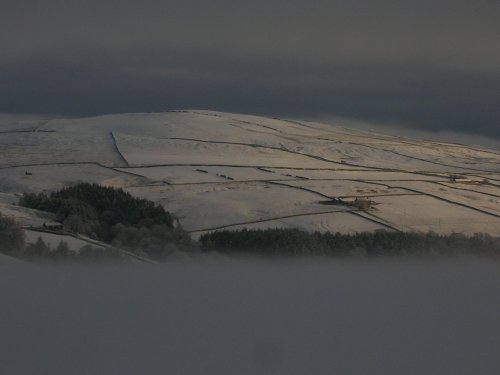 Mist below the tops