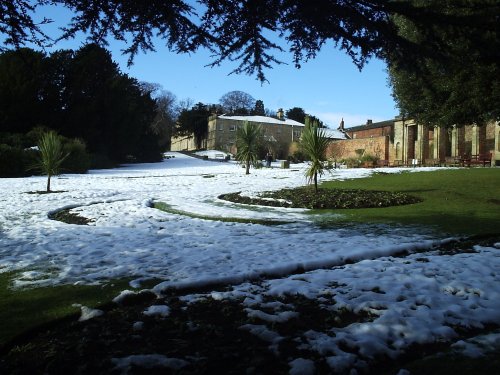 Looking towards the hall from under the trees