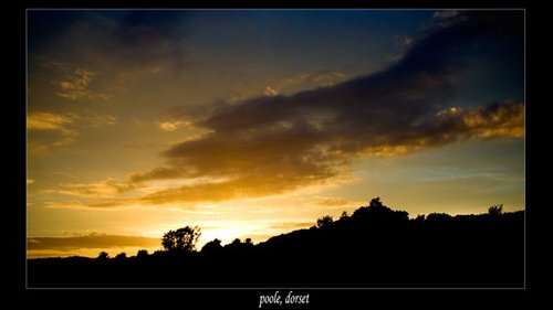 Poole, Dorset. Sunset over sand dunes